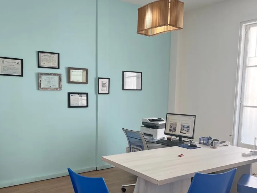 Our licences and memberships, framed on the wall of the Buenos Aires office