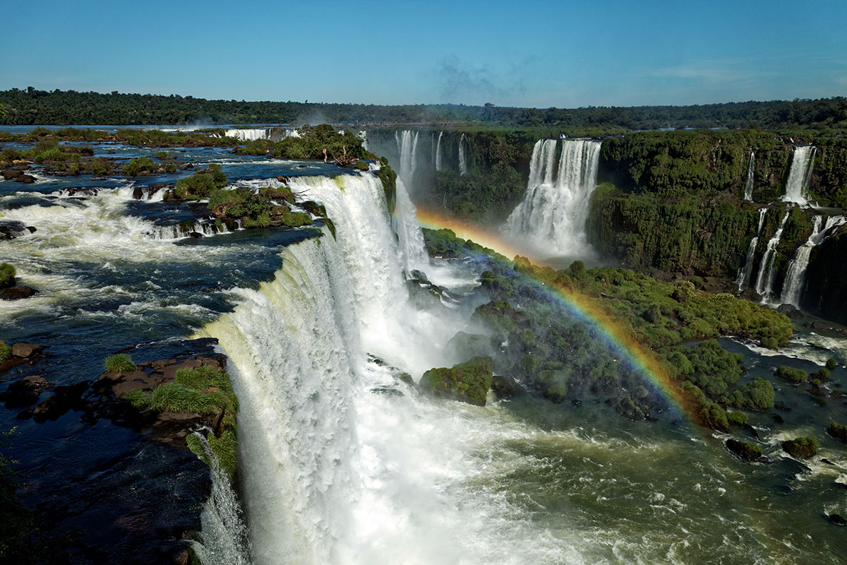 A rainbow over the Iguazu Falls seen from the Argentine national park