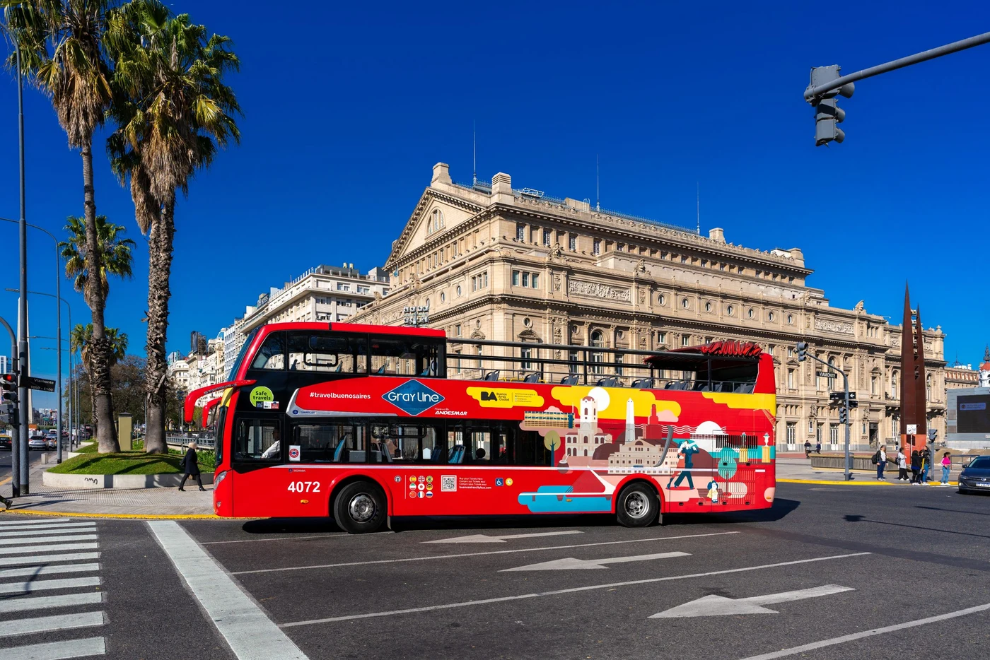 Hop-on hop-off bus passing Buenos Aires landmarks