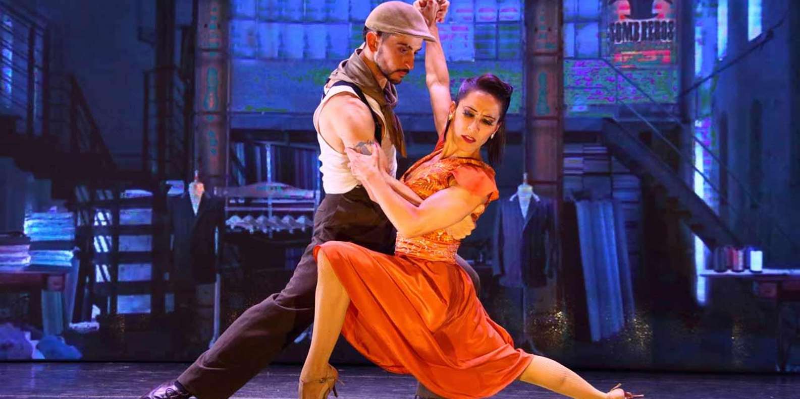 Tango dancers performing on stage at a dinner show in Buenos Aires
