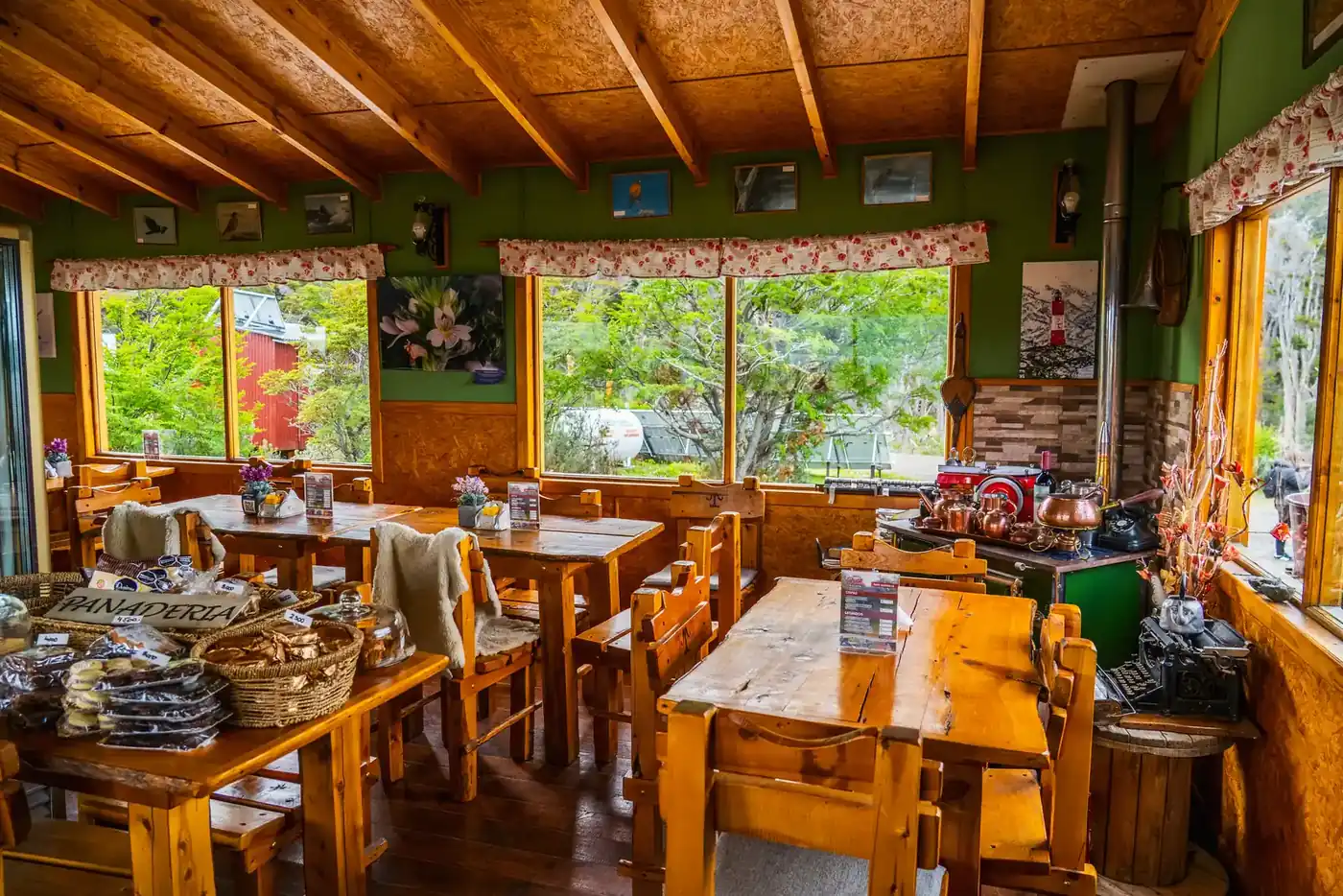 The tea room of the southernmost farm in the world, with baskets of cakes on the table