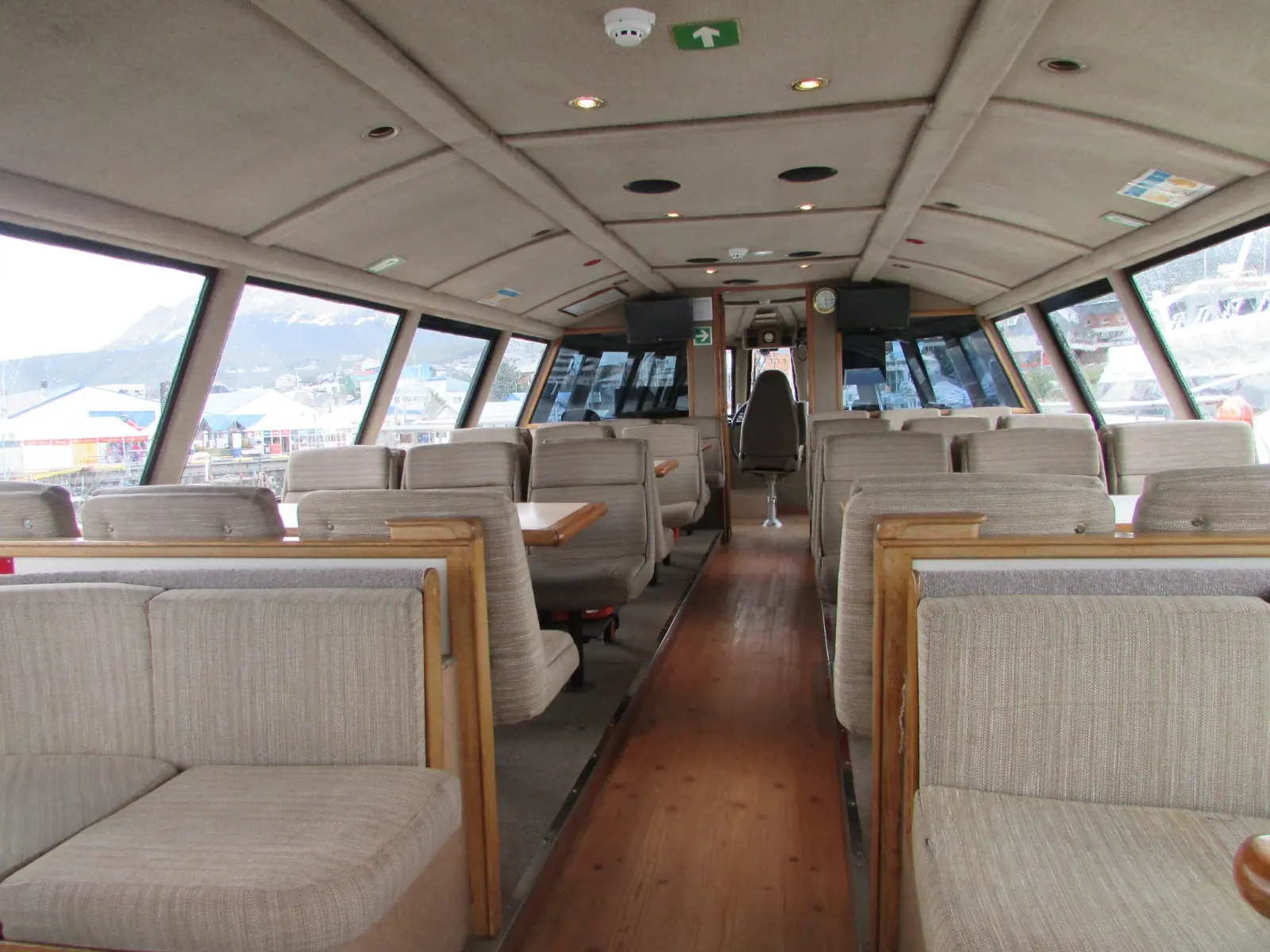 Inside the catamaran: heated saloon with panoramic windows over the Beagle Channel