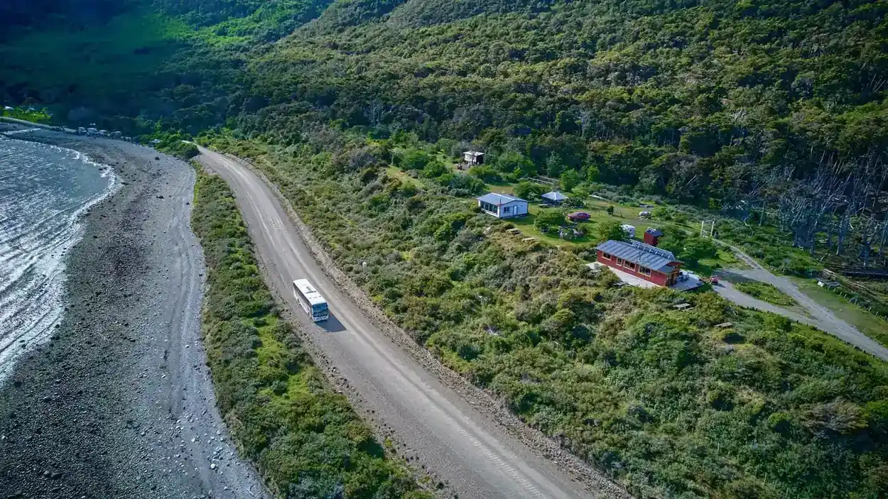 Aerial view of the gravel spit near Puerto Almanza with the beach below and the coast road above